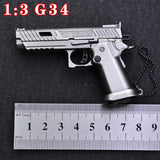 1:3 gun model children's toy G34 pit viper shell throwing keychain gun alloy gun foreign trade, non-firing