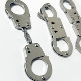 Thickened stainless steel adult toy thumb buckle toe . shackle entertainment keychain mini small handcuff toy