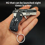 10PCS  Neue Hohe  Voll Metall Miniatur Modell Pistole Pistole Keychain Faltbare Anhänger  Geburtstag Geschenk Spielzeug Junge